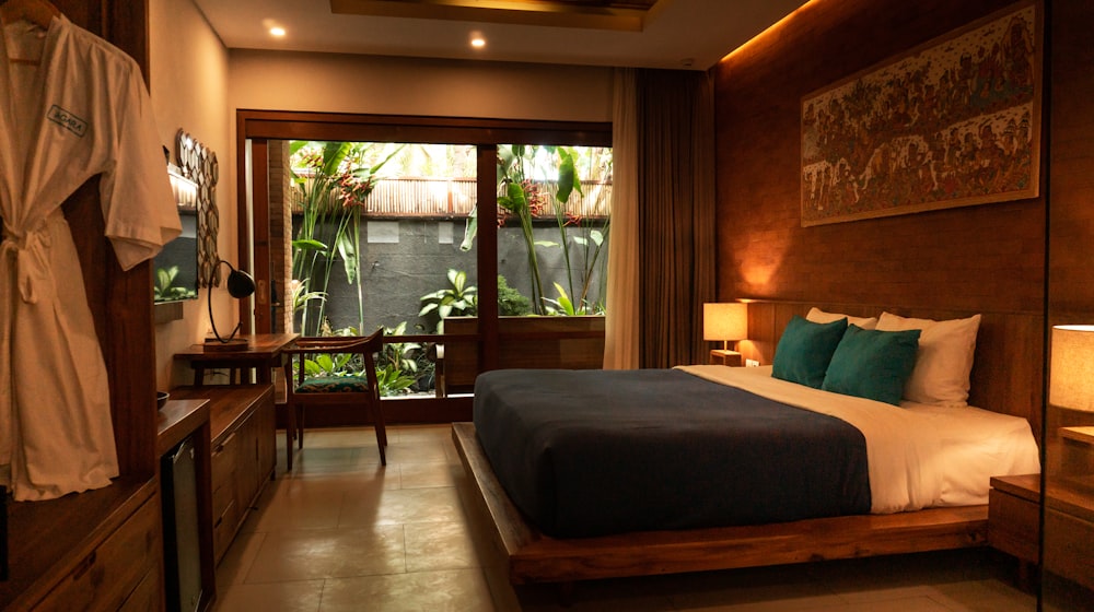 A well-appointed hotel room bed and seating area