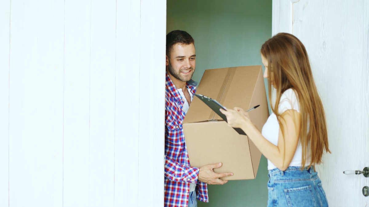 Delivery boxes from online shopping stacked at a doorstep