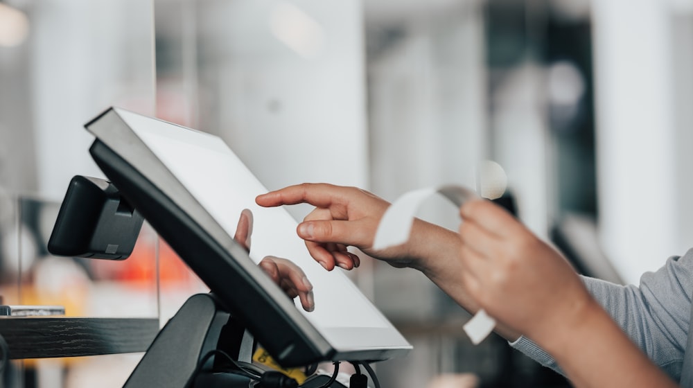 A card payment terminal being used at checkout