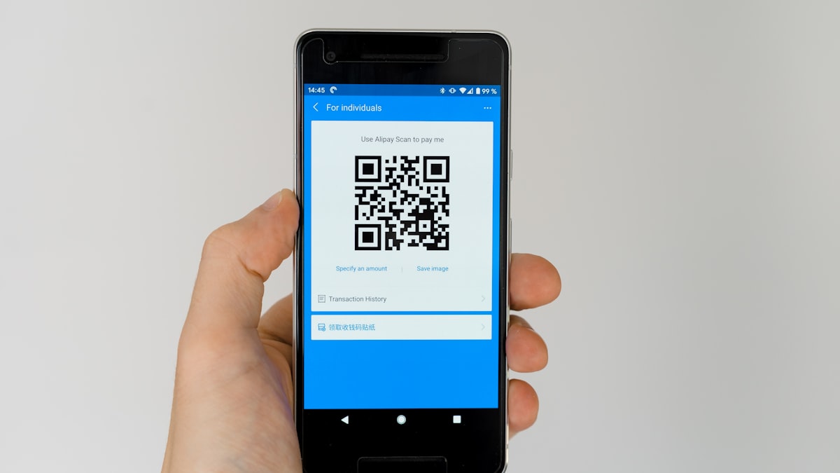 Smartphone displaying a UPI QR code payment screen